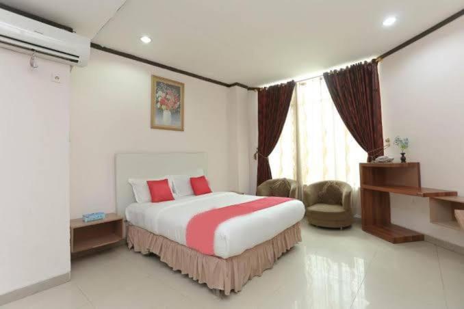 בנג'ארמאסין Urbanview Hotel Kharisma Banjarmasin מראה חיצוני תמונה